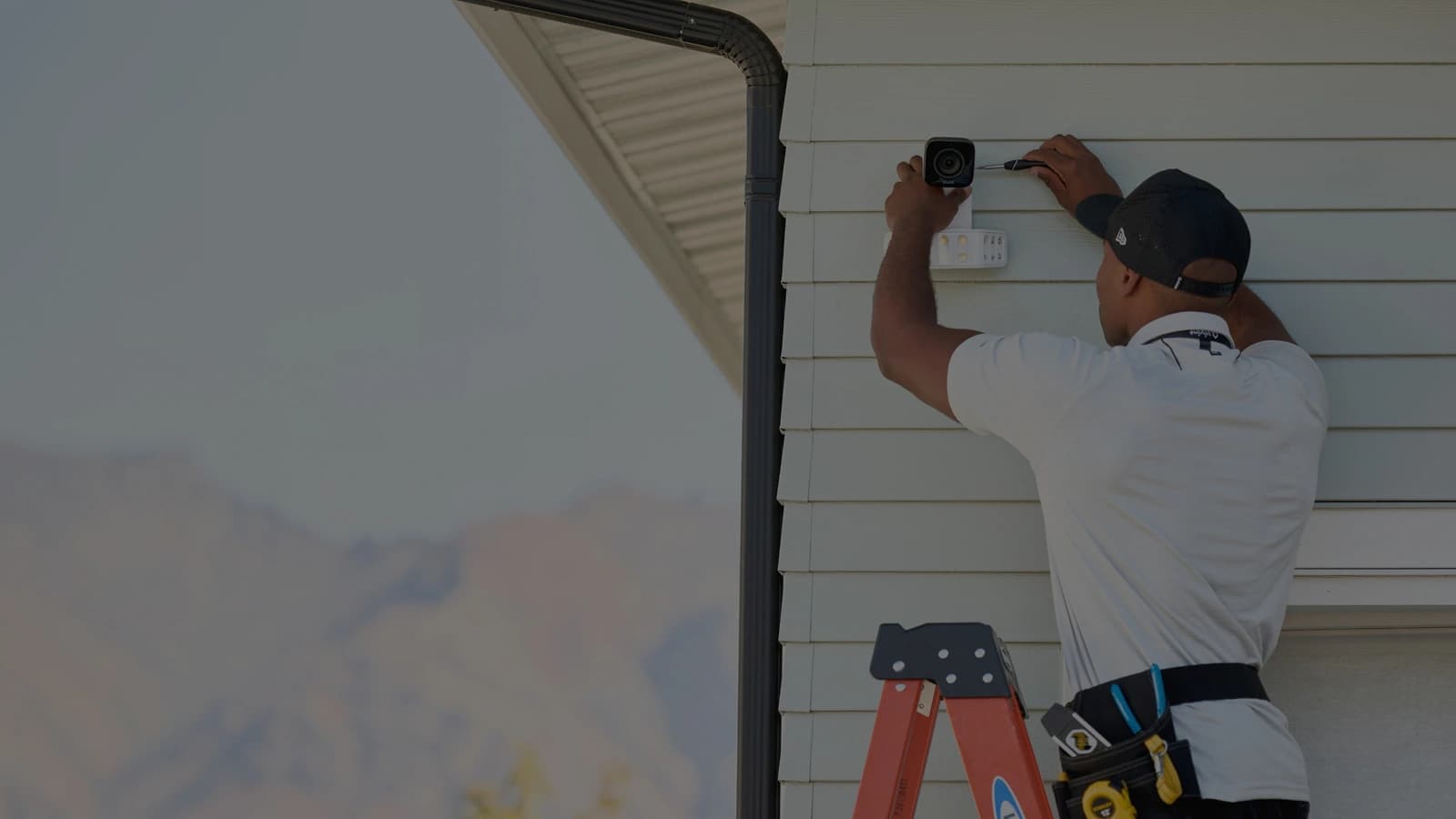 Vivint technician installing smart home security